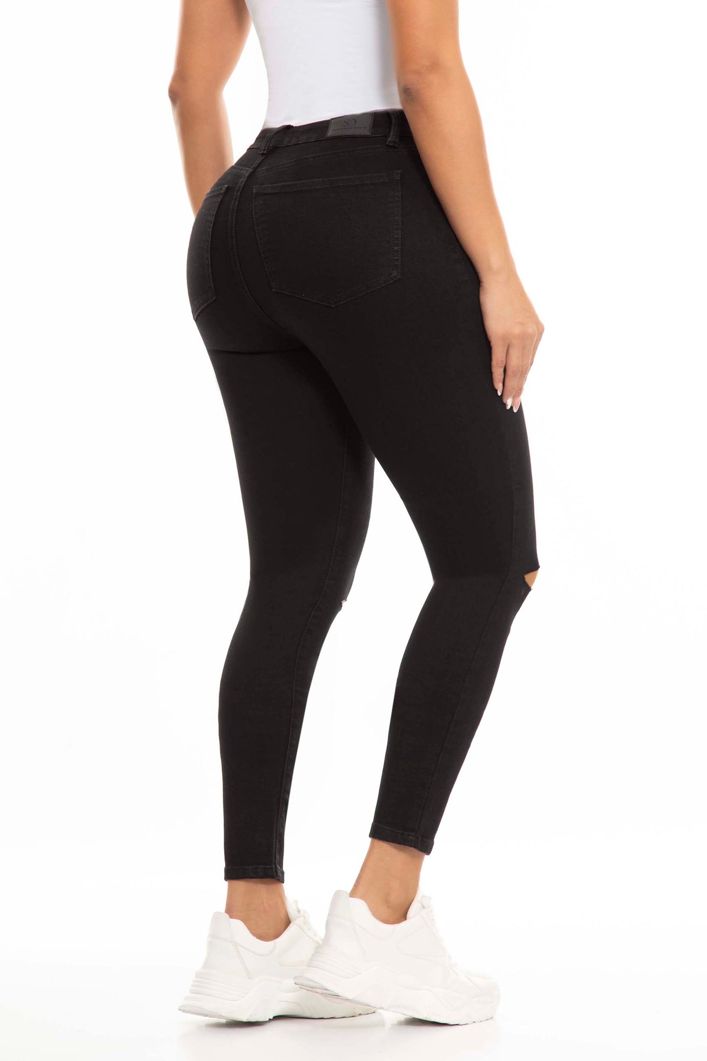 Ref. S9901 Black skinny elastic jeans ripped at the knees